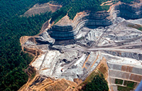 As much as 600 feet of a mountain has been removed to access a narrow coal seam below
